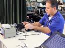 W1AW Station Manager Joe Carcia, NJ1Q, sets up Earth-station gear in advance of the ARISS event at Connecticut’s Ashford School. [Michelle Patnode, W3MVP, photo]

 